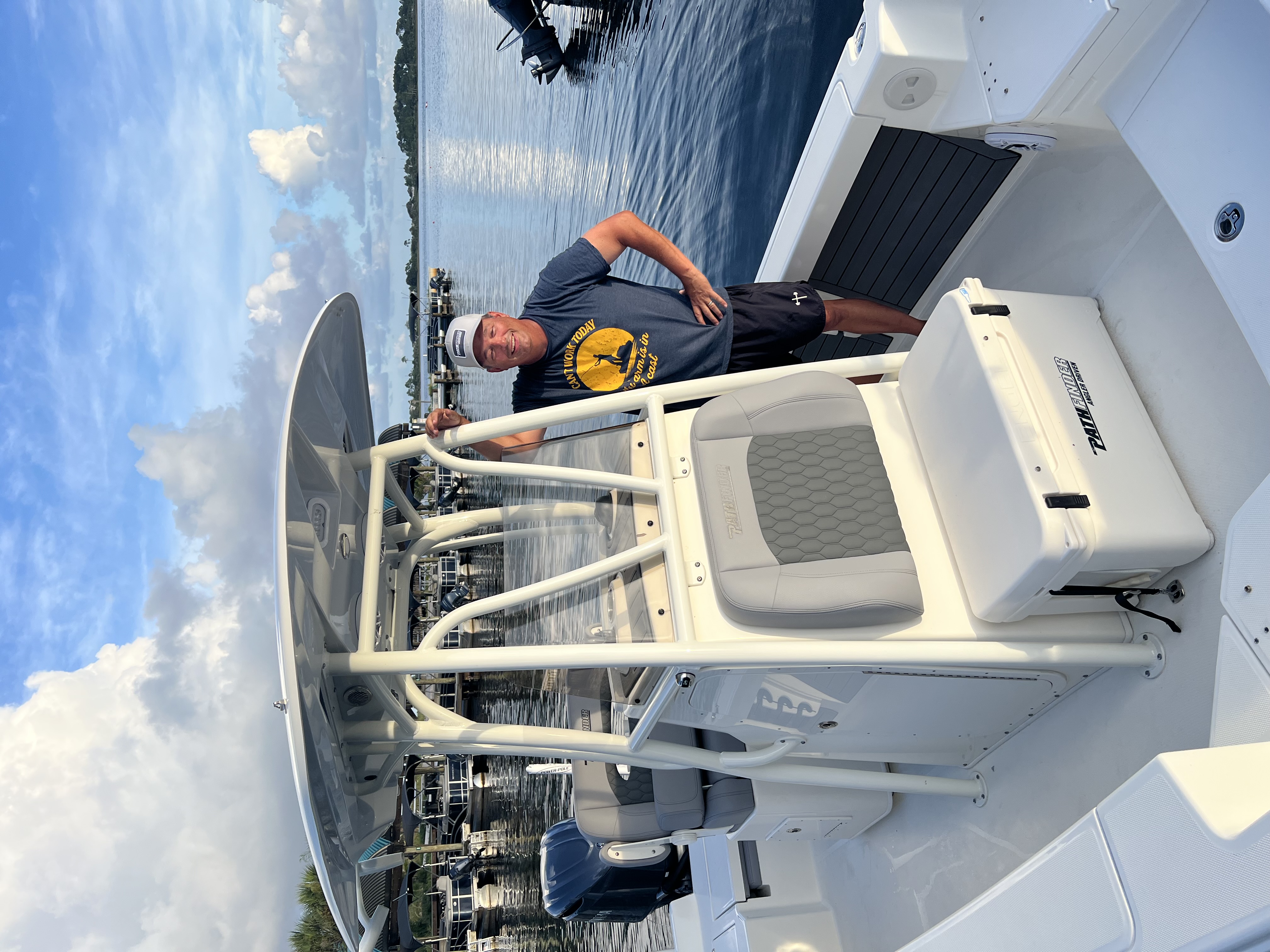 Captain on the boat at the helm